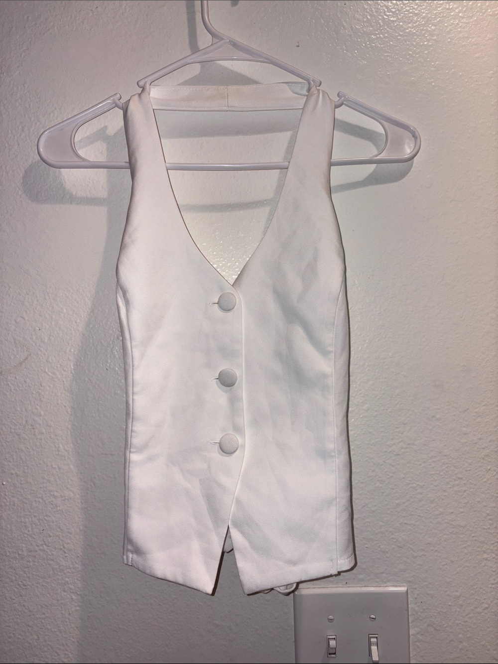 White Sleeveless V-Neck Button Front Vest Top